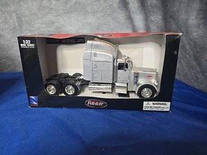 New Ray PETERBILT MODEL 379 LONG HAULER COLLECTION Silver - Picture 1 of 4
