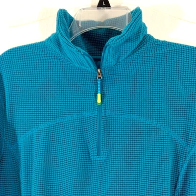 Top deportivo azul mandarina mujer XL manga larga bolsillo cuarto cremallera cuello falso Foto 1 de 4