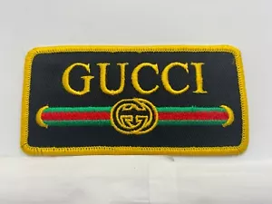 GUCCI NUOVO RICAMO AZIENDA FERRO SU NOME TOPPA ETICHETTA - Foto 1 di 1