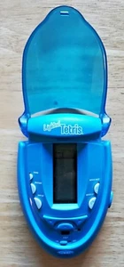 Lighted Tetris Electronic Handheld Game RADICA Blue w/ Lid & Sound - Picture 1 of 5