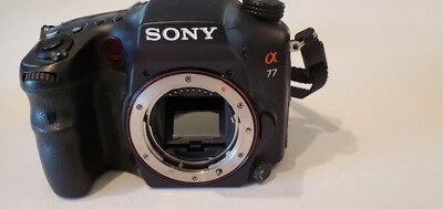 Sony Alpha SLT-A77V DSLR package w/ lenses and flash - Image 1 of 4
