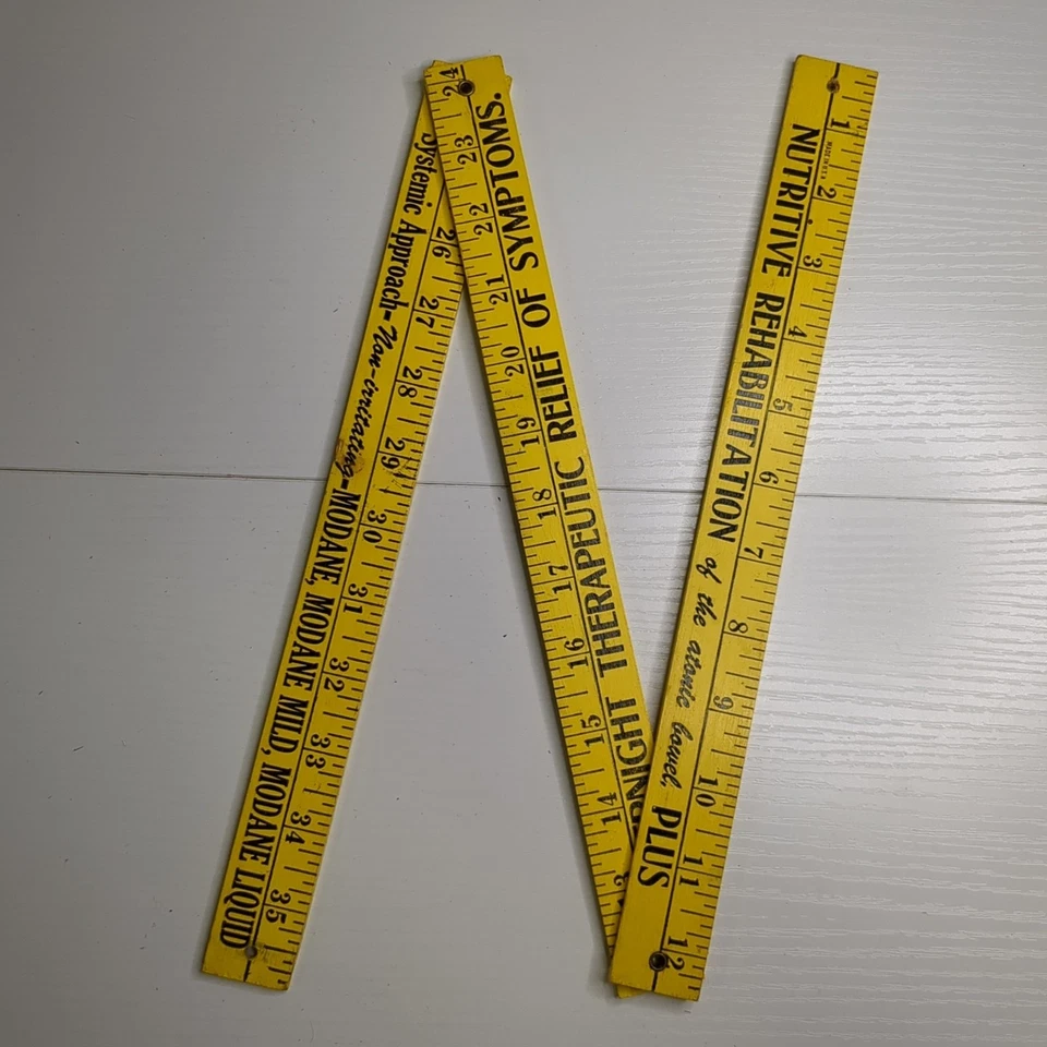 Memorabilia publicitaria de palo de patio de regla plegable vintage Foto 1 de 3