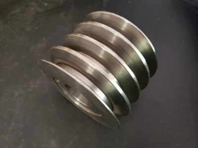 CAT 6N-1186: 4 GROOVE BELT TENSIONER PULLEY. New OEM Part - Image 1 of 4