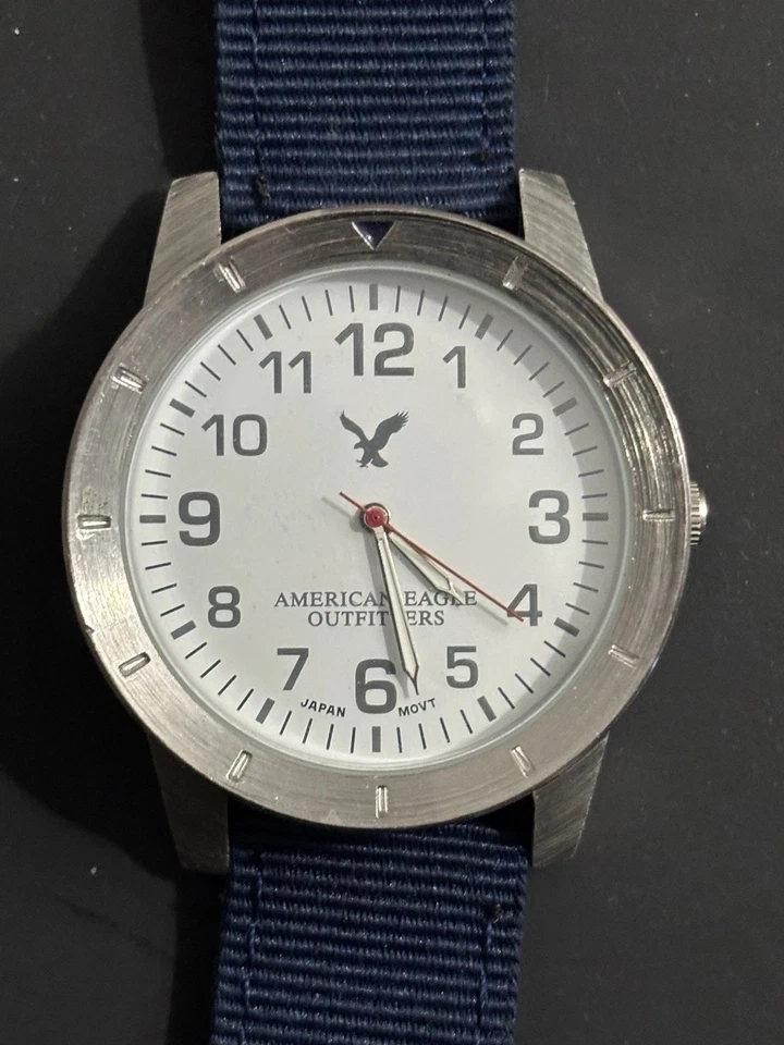 American Eagle Watch Men Silver Tone Blue Slip Thru Nylon Band New Battery 10" - Image 1 of 4