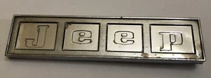 1960s/1970s JEEP COMMANDO/GLADIATOR/JEEPSTER/WAGONEER TAILGATE EMBLEM - Picture 1 of 2