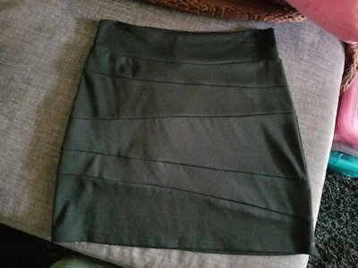 Minifalda elástica negra mediana Honey Punch para mujer  Foto 1 de 3