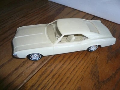 1966 Buick RIVIERA HARDTOP DEALER PROMO FRICTION CAR - White - Image 1 of 4