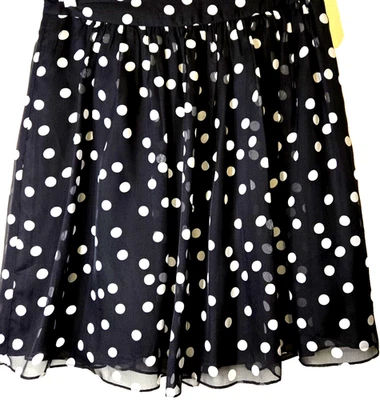 Falda patinadora de seda negra Saks Fifth Avenue para mujer 6 lunares negros acampanada transparente Foto 1 de 4