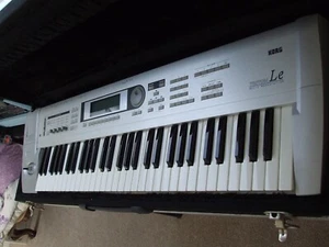 Korg Triton LE 61 synth in Good Condition with blue display and hard flight case - Picture 1 of 7