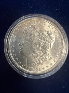 1883 O Morgan Silver Dollar - Picture 1 of 2