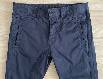 Pantalones elásticos Diesel negros dorados para hombre talla 48 Foto 1 de 4