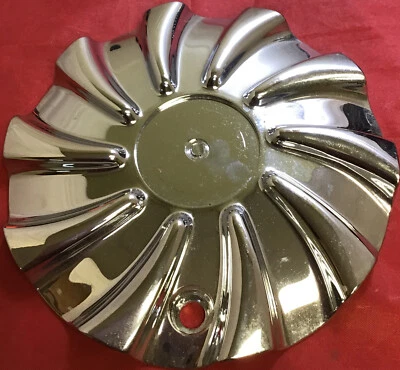 UNA TAPA CENTRAL CROMADA CONCEPT LLANTAS USADAS-171450 11920 Foto 1 de 4