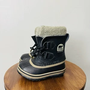 Botas de nieve Sorel Yoot Pac forradas de piel de goma negras niños talla 8 - Imagen 1 de 9