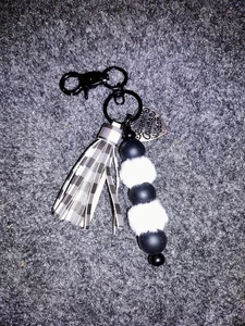 HANDMADE BLACK AND WHITE SILICONE BEAD KEYCHAIN WITH CHARM AND TASSEL - Picture 1 of 3