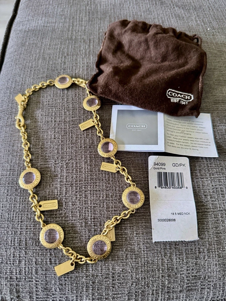 "Collar gargantilla a presión de latón Coach Daphne de vidrio rosa con cabeza a presión de 18"" edición limitada" Foto 1 de 1