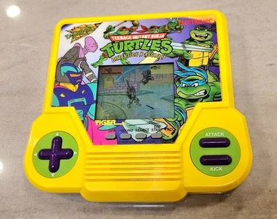 Tiger Teenage Mutant Ninja Turtles Dimension X Assault Electronic Handheld WORKS - Image 1 of 4