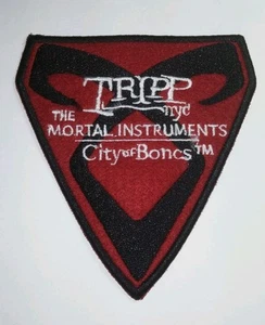 TRIPP THE MORTAL INSTRUMENTS CAZADORES DE SOMBRAS CIUDAD DE HUESOS NYC CREST COSTURA EN PARCHE - Imagen 1 de 1