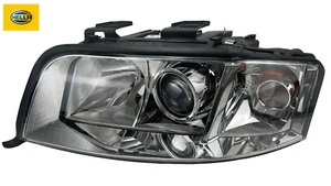 HELLA Hauptscheinwerfer für Audi A6 4B C5 H7 ab 06.2001 mit Stellmotor LWR LINKS - Bild 1 von 6