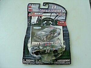 #14 TONY STEWART - FOREVER A CHAMPION CHEVY - 2017 WAVE 3 - NASCAR AUTH - 1:64