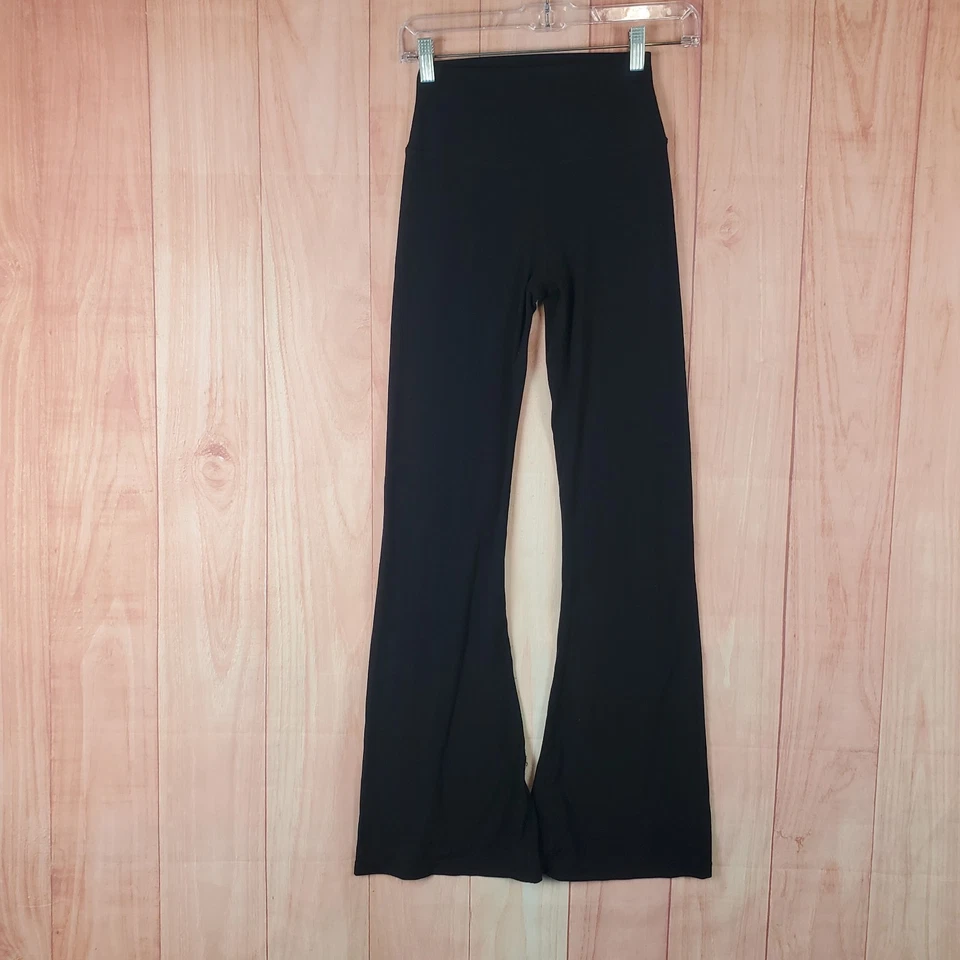 Splits59 Raquel Leggings Acampanados Mujer Pequeños Negros Elastizados Logo Calce Cruzado Entrenamiento Foto 1 de 4