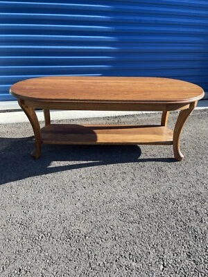 Mid Century Oval Oak Coffee Table with lower shelf storage 18.5” T 23” W 48” L - Image 1 of 4