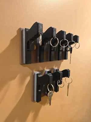 Porta llaves con mango de pistola - Tiene capacidad para 3 o 5 llaves Foto 1 de 4