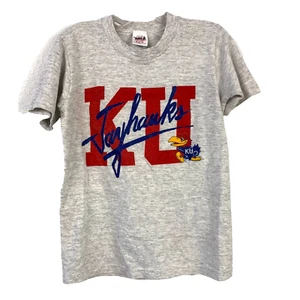 Camiseta vintage años 80 KU Kansas University Jayhawks H. Wolf & Son niños 10-12 - Imagen 1 de 4