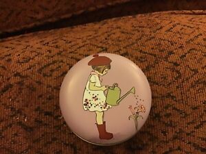 Belle And Boo small round tin, 6.5x3cms, Girl with Watering Can