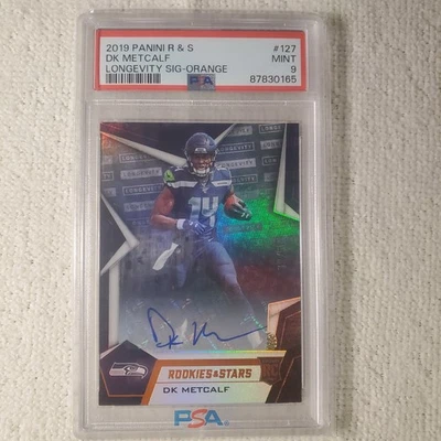 DK Metcalf 2029 Rookie & Stars Longevity Auto Laranja RC 39/60 PSA - Imagem 1 de 4