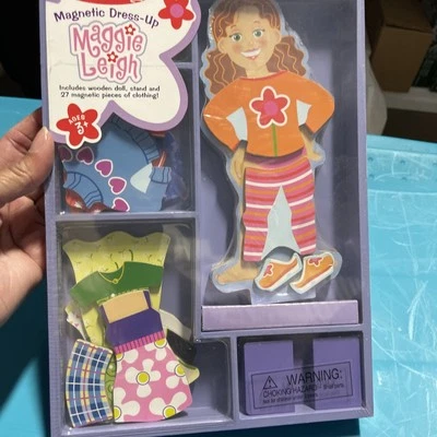 Melissa and Doug Magnético Vestir Maggie Leigh Juguete Niña Púrpura Jugar Madera Foto 1 de 4