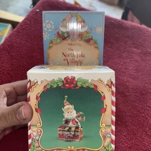 Enesco The North Pole Village Travis Santa Elf Sitting on a Chest - Picture 1 of 15