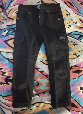 Pantalones de mezclilla ajustados negros para niños Foto 1 de 4