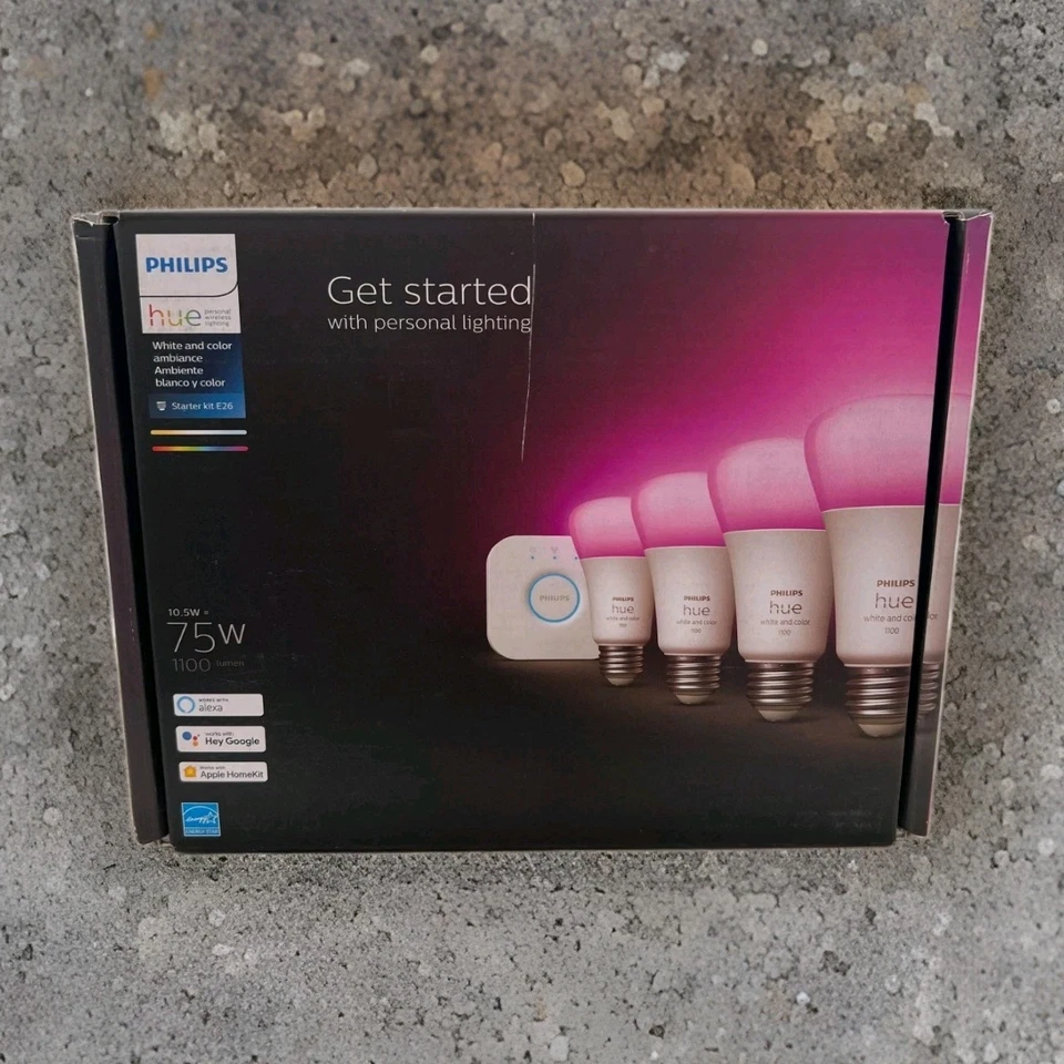 ¡SELLADO! Philips Hue Kit 75 vatios A19 LED inteligente cambio de color 4 bombillas y 1 puente Foto 1 de 1