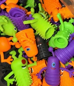 50 Finger Puppets Toys Funny Colorful Monster Stretchy Finger Puppets New - Picture 1 of 3