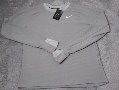 Pullover Nike Running Therma Sphere gris cálido talla mediana para mujer CU3261-025 Foto 1 de 4