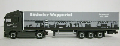 Herpa 945707 Iveco S-Way Bücheler Spedition autoarticolato valigia - Immagine 1 di 4