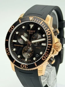 Orologio Uomo TISSOT Seastar 1000 Cronografo Quadrante Nero/Oro T120.417.37.051.00 - Foto 1 di 7