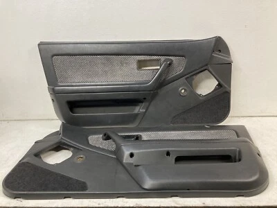 Par de tarjetas de panel de puerta izquierda y derecha Honda CRX 1986-1987 negro/gris OEM con reposabrazos Foto 1 de 4