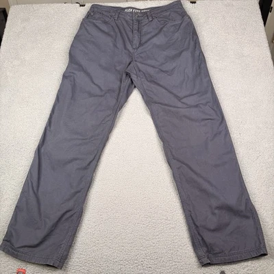 Pantalones comerciales Duluth para hombre 34x34 gris flexible manguera contra incendios ajuste relajado ropa de trabajo utilitaria Foto 1 de 4