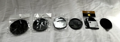 Set of 6: Lens Caps, 82mm, 72mm, 67mm, 62mm, 58mm, 55mm, Nikon, Sealed/Excellent - Image 1 of 4