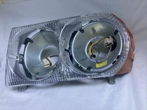 Mercedes Benz R107 Left Side Bosch Head Light Assembly 0302 355 003 - Picture 1 of 7