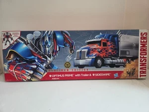 Transformers Age of Extinction - Edición Platino - Optimus Prime con deslizamiento lateral OB - Imagen 1 de 11