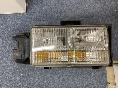 OEM Right Passenger Side Headlight Lamp w/mount for 93-96 Cadillac Fleetwood - Image 1 of 4