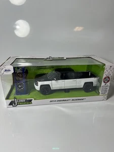NIB 2022 2014 CHEVROLET SILVERADO 4X4 TIRE RACK JUST TRUCKS SERIES JADA 1/24 - Picture 1 of 6