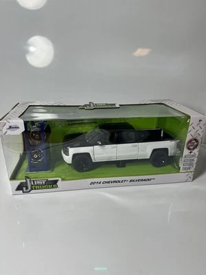 NIB 2022 2014 CHEVROLET SILVERADO 4X4 TIRE RACK JUST TRUCKS SERIES JADA 1/24 - Image 1 of 4