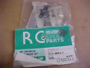NICHIMO A04 = CONTROLLER SERVO HOLDER SET - Picture 1 of 3