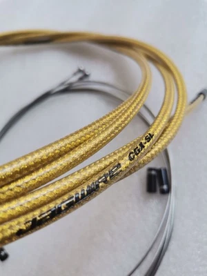 KIT DE CABLE DE MANGUERA DE FRENO JAGWIRE TRENZADO DORADO PULIDO LUBRICANTE CGX SL CARRETERA MTB TAPAS CNC Foto 1 de 4