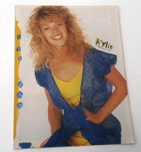 KYLIE MINOGUE 'blue/yellow dress' magazine PHOTO / Pin up 11x8 inches - Imagen 1 de 1