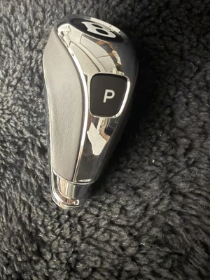 Perilla de cambio de marchas Bentley Bentayga 2017-18 cromada oculta negra 36A858999A OEM NUEVO Foto 1 de 4