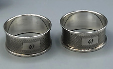 Pair of English Sterling Silver Napkin Rings 7/8" wide with engraved pattern